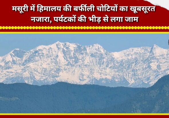 Beautiful view of the snow-capped Himalayan peaks in Mussoorie; traffic jams caused by crowds of tourists.